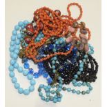 A necklace of Murano glass beads, a pinchbeck guard chain and other glass necklaces and a bracelet.