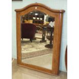 A 19th century French burr walnut cross-banded pier mirror, the arched corniced frame enclosing a