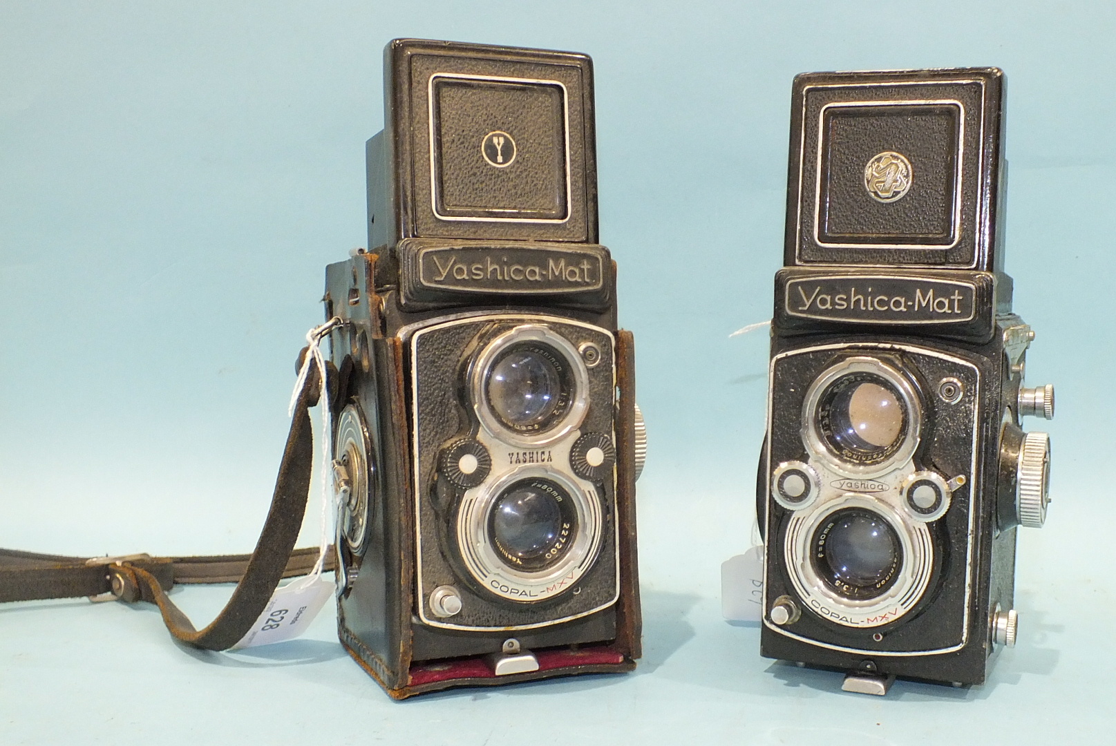 A Yashica-Mat Copal MXV twin-lens reflex camera with part of leather case, (a/f) and another, - Image 2 of 2