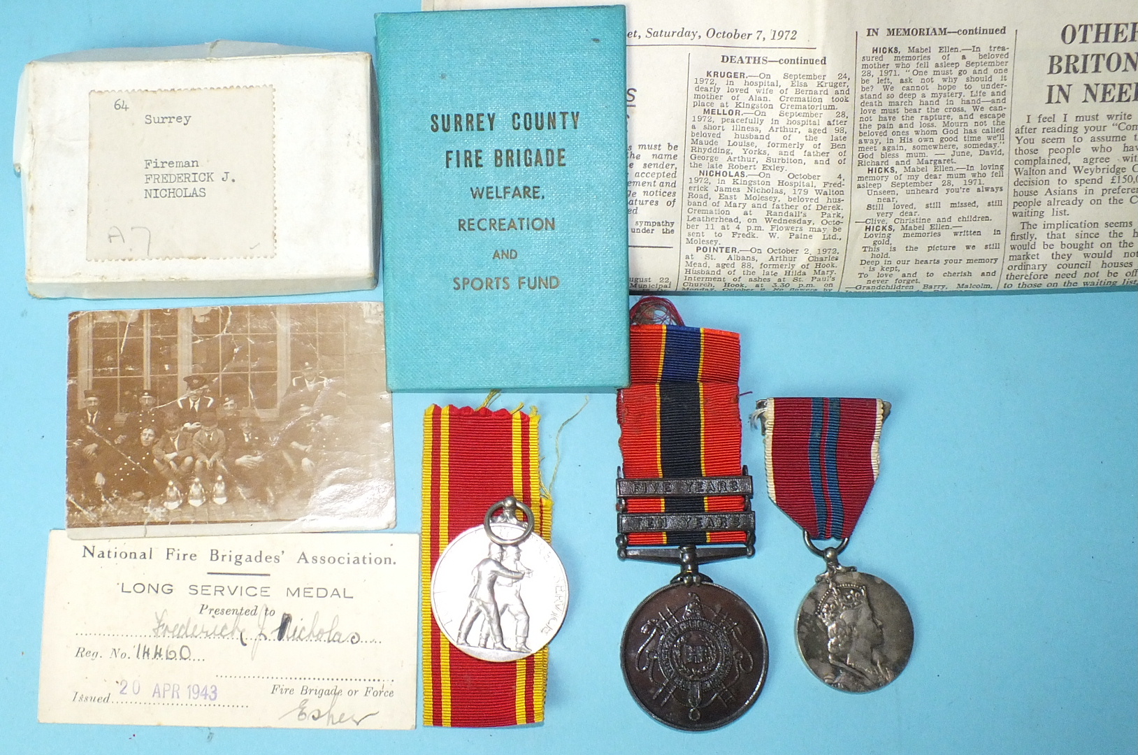 An Exemplary Fire Service Medal awarded to Fireman Frederick J Nicholas, with ribbons, envelope