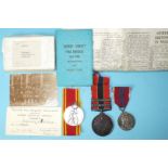 An Exemplary Fire Service Medal awarded to Fireman Frederick J Nicholas, with ribbons, envelope