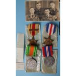 A WWII group of four medals awarded to Eric Biddle RAF: Africa Star with North Africa 1942-43 clasp,