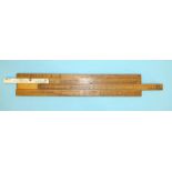 A Gangarams boxwood and ivory slide rule stamped "Stanley, Great Turnstile, Holborn, London", the