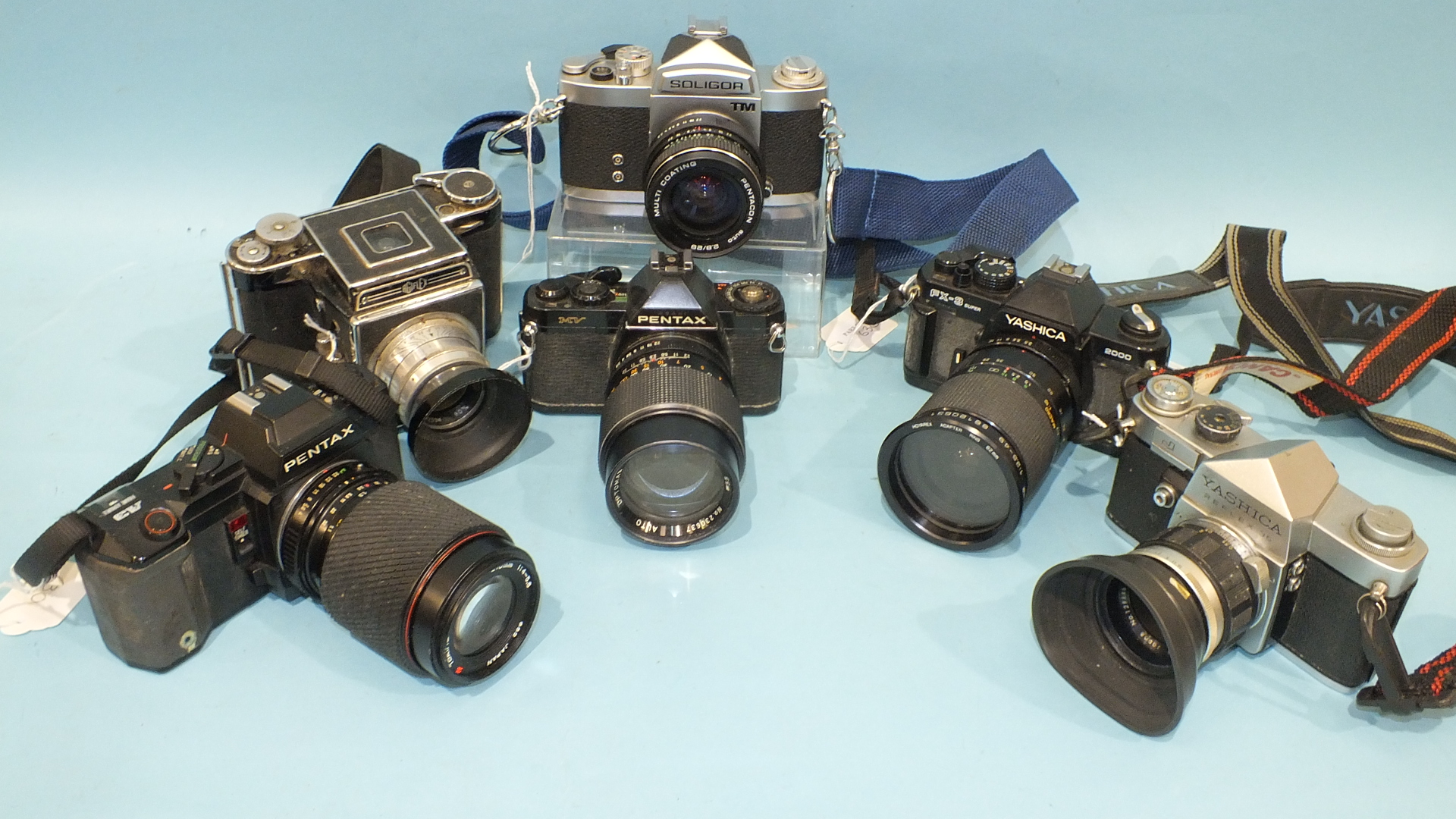 Six SLR cameras: Pentax A3, Yashica Reflex-35, Soligor TM, Agiflex (a/f), Pentax MV and Yashica Fx-3