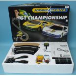 Scalextric a G T Championship motor racing set, comprising cars, track and accessories, etc, boxed.