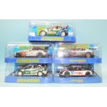 Five modern Scalextric cars by Hornby Hobbies Ltd, all in plastic boxes.