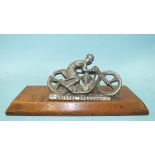 A vintage cast metal figure of a 1930's/40's speedway rider on machine, with "Bristol Speedway"