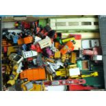 A large quantity of playworn diecasts by Corgi, NZG, Matchbox, etc.