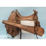 A 1904 pattern US Army McClellan leather saddle with 11½'' seat, stamped on shield escutcheons to