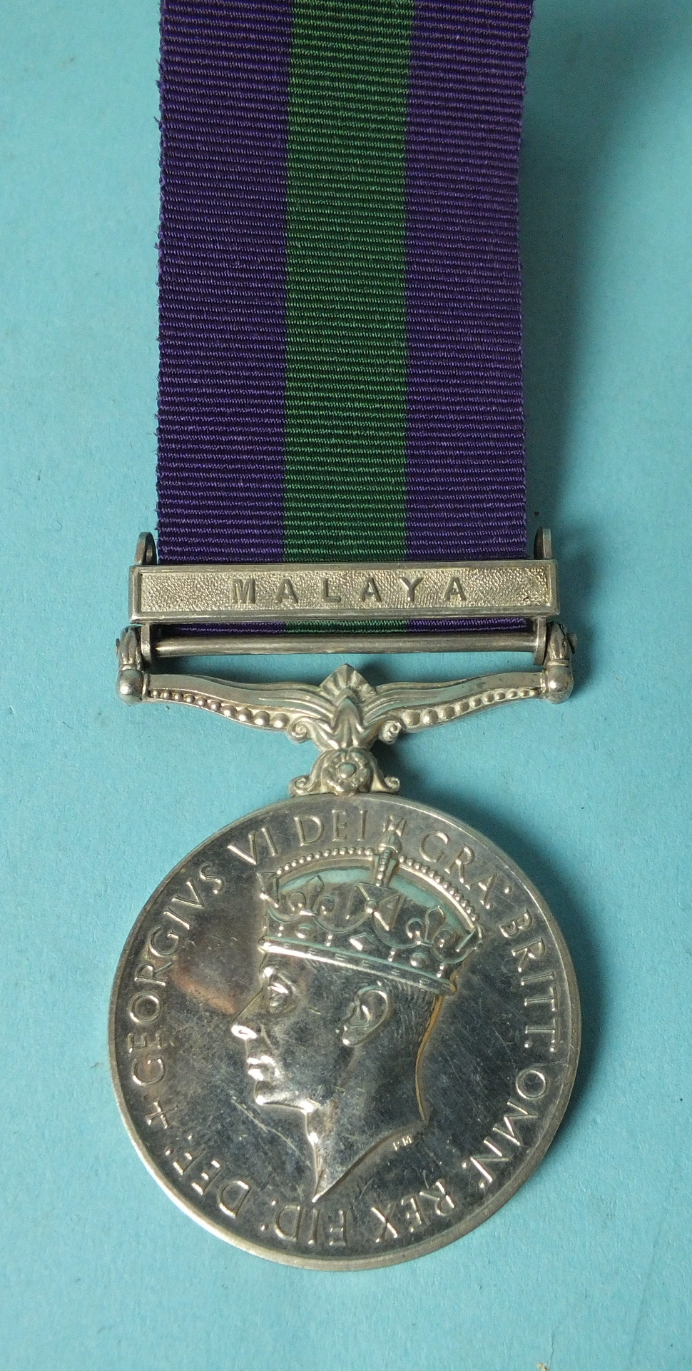 A General Service Medal with Malaya clasp awarded to MYA/18105595 Spr Ahmad B Hashi RE.