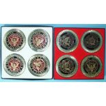 Two sets of four enamelled United States Senate coasters, boxed.
