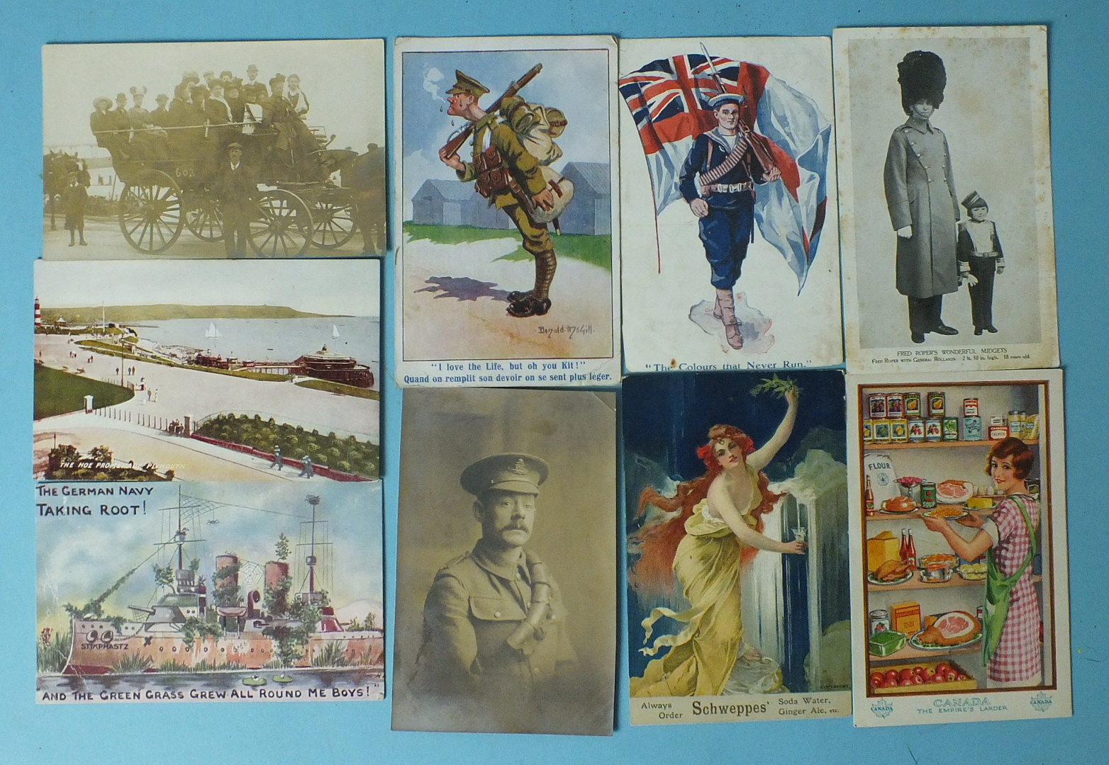 A collection of approximately 50 postcards, including a Schweppes advertising card, a "Canada the