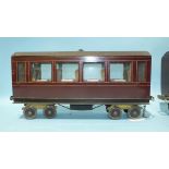 Three scratch-built 3" gauge bogie coaches with seat and tables inside, each 42.5cm long and a