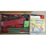 A quantity of mainly red and green Meccano, c1960's with three instruction booklets, in wooden box.