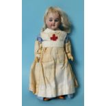 A small bisque head doll with sleeping blue eyes and blonde mohair wig, on jointed composition