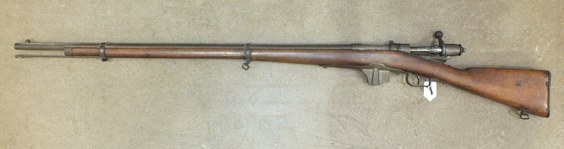 A Torre Annunziata 1889 10.5mm bolt-action rifle with full wood stock and rammer, 135cm overall,