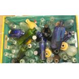 A collection of 54 glass and stoneware mineral water, ginger beer and medicine bottles, including