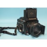 A Mamiya 645 1000S medium format camera with Mamiya-Sekor 1:2.8 F80mm lens no.147635.