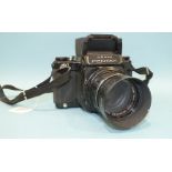 An Asahi Pentax 6x7 camera with Takumar/6x7 1:2.4/105 lens no.5575295, black body, serial no.