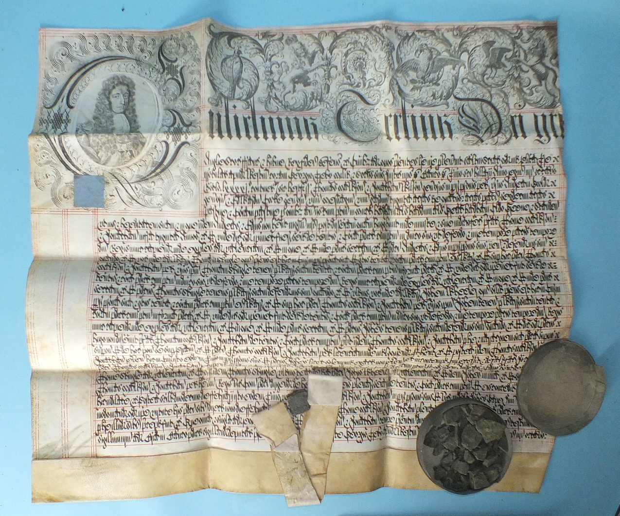 A William III recovery document, vellum, with remains of a seal in tin case and a George II vellum - Image 2 of 3