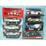 Eight modern Scalextric-style slot racing cars, various makes, all boxed, (8).