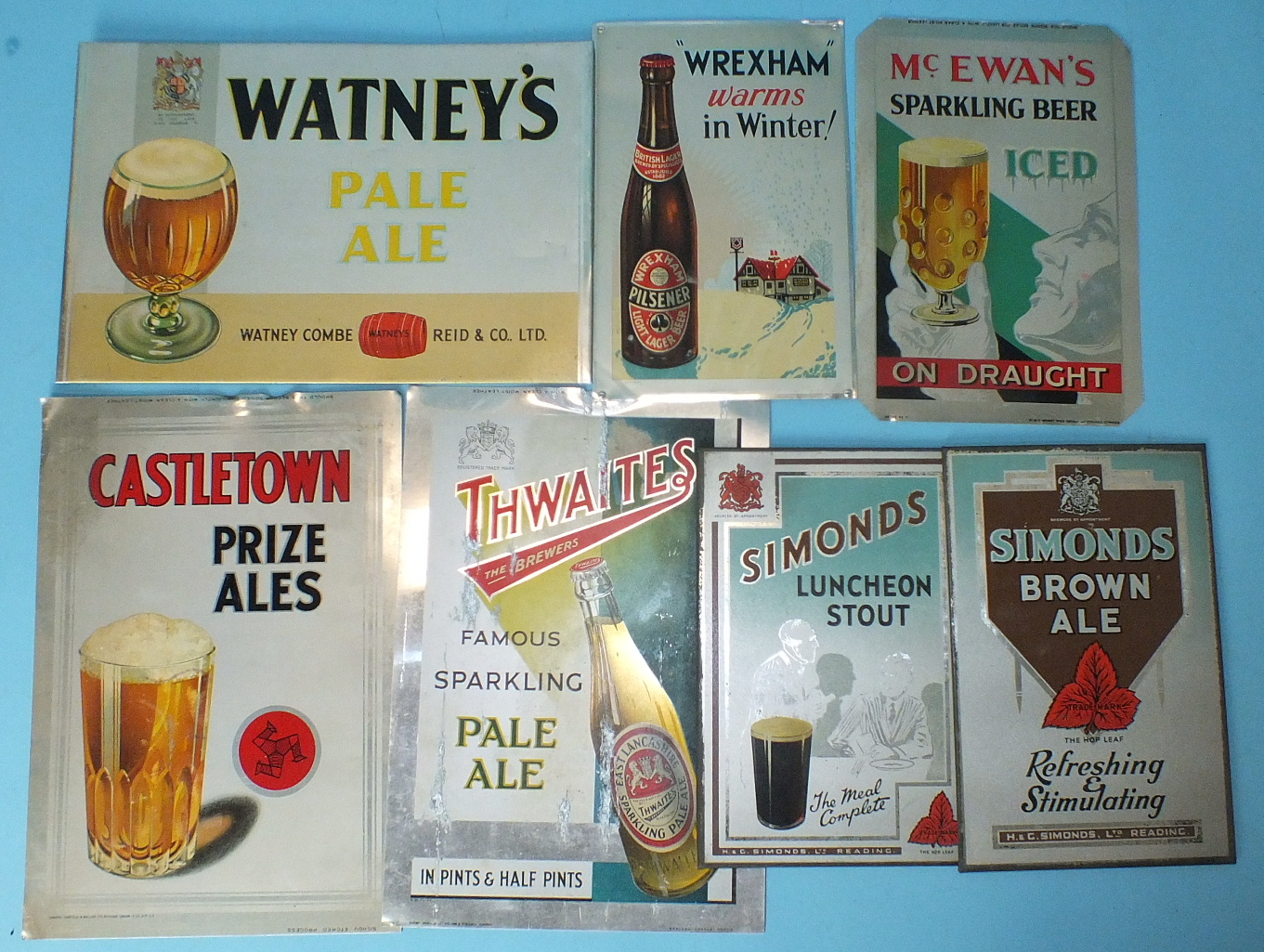 Seven tin advertising signs, including "Castletown", 29 x 20cm and two "Symonds": Luncheon Stout and