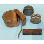 A 2½'' alloy and brass trout reel, a Hardy Bros Ltd leather reel box to fit a 3'' reel, a Hardy Bros