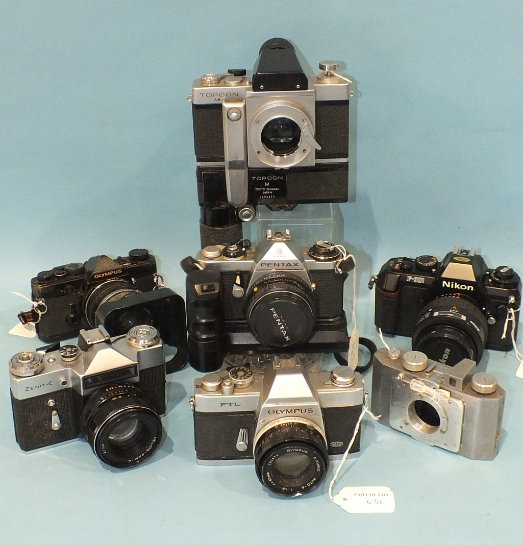 Seven SLR cameras: Top con.AM Olympus OM-1 and FTL, Pentax ME, Nikon F-301, Zenit-E and a 1952 - Image 2 of 2