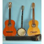 A Victor Garcia six-string guitar, a Hondo model H308-1 six-string guitar and a banjo stamped "