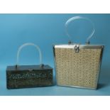 A 1950's handbag with pierced metal sides and grey Lucite lid and handle, 18cm long and another of