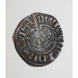 An Edward I hammered silver penny.