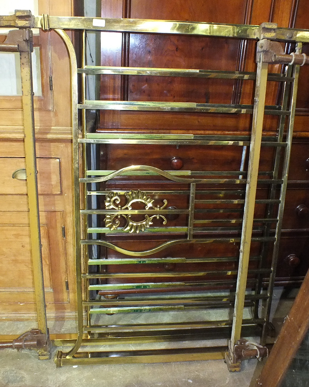 A Victorian 4' 6'' brass bed.