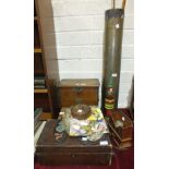 An Edwardian metal-bound oak stationery cabinet with hinged front opening to reveal a hinged