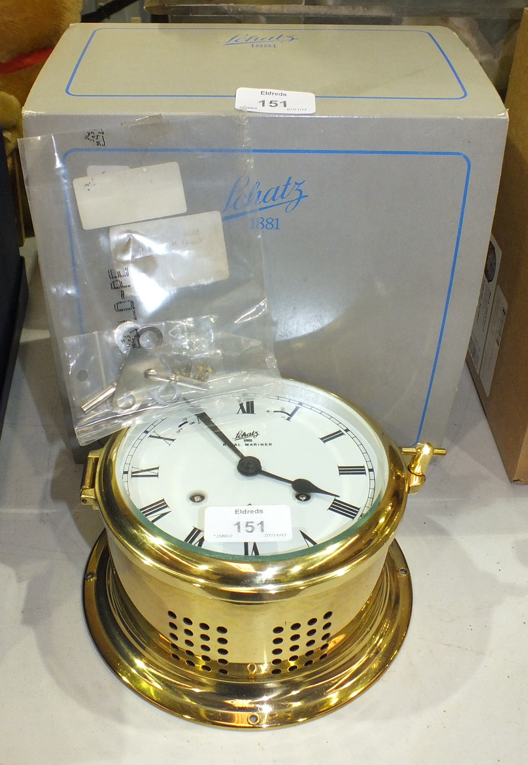 A Schatz 'Royal Mariner' brass circular chip's clock, 18cm diameter, with original box.