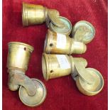 A set of four heavy duty large brass table castors stamped 'Cope's Patent'.
