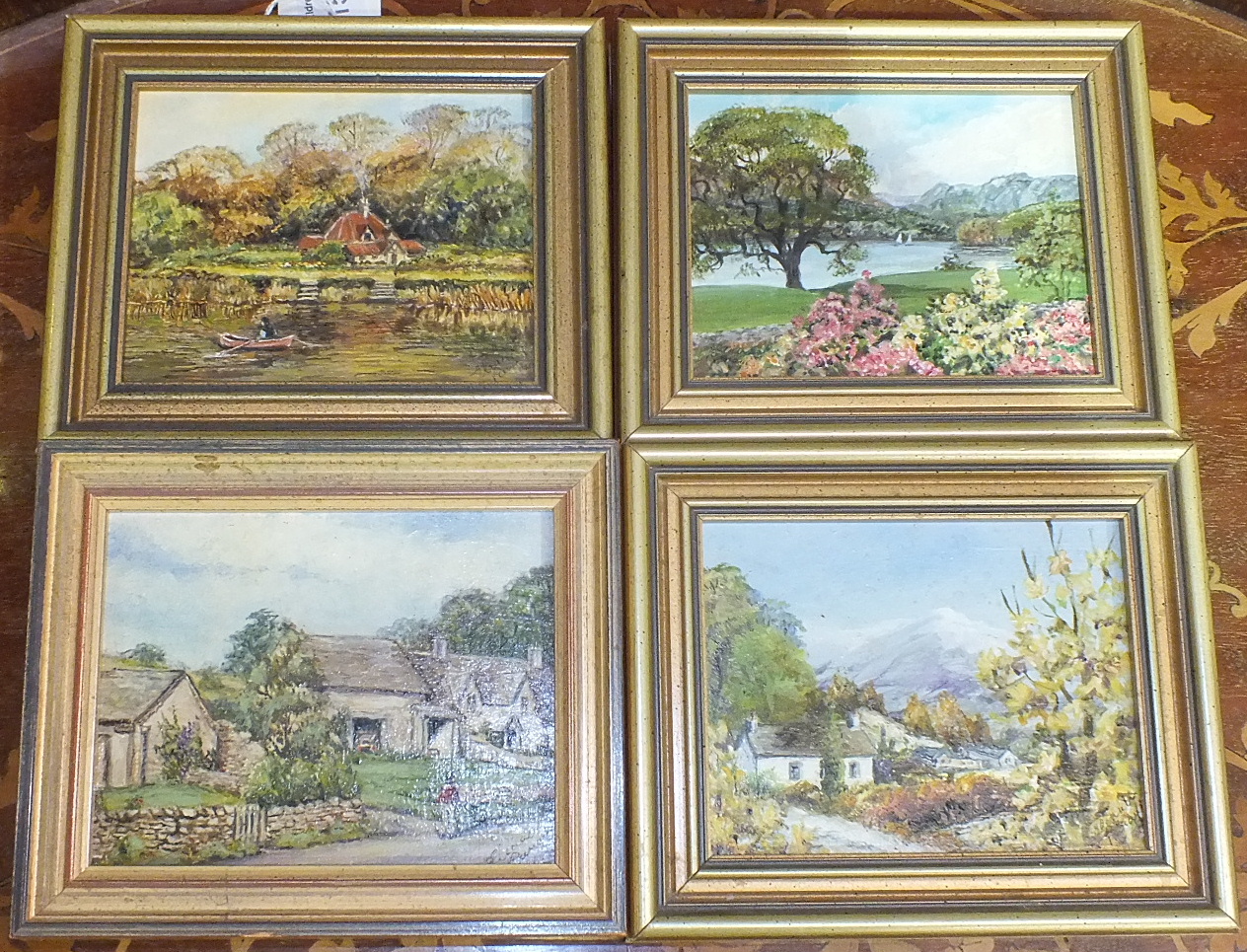 Eleanor Panayi, a collection of six small framed oil paintings, four depicting landscapes, one still