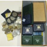 A collection of British and foreign coinage, including a small quantity of pre-1947 silver.