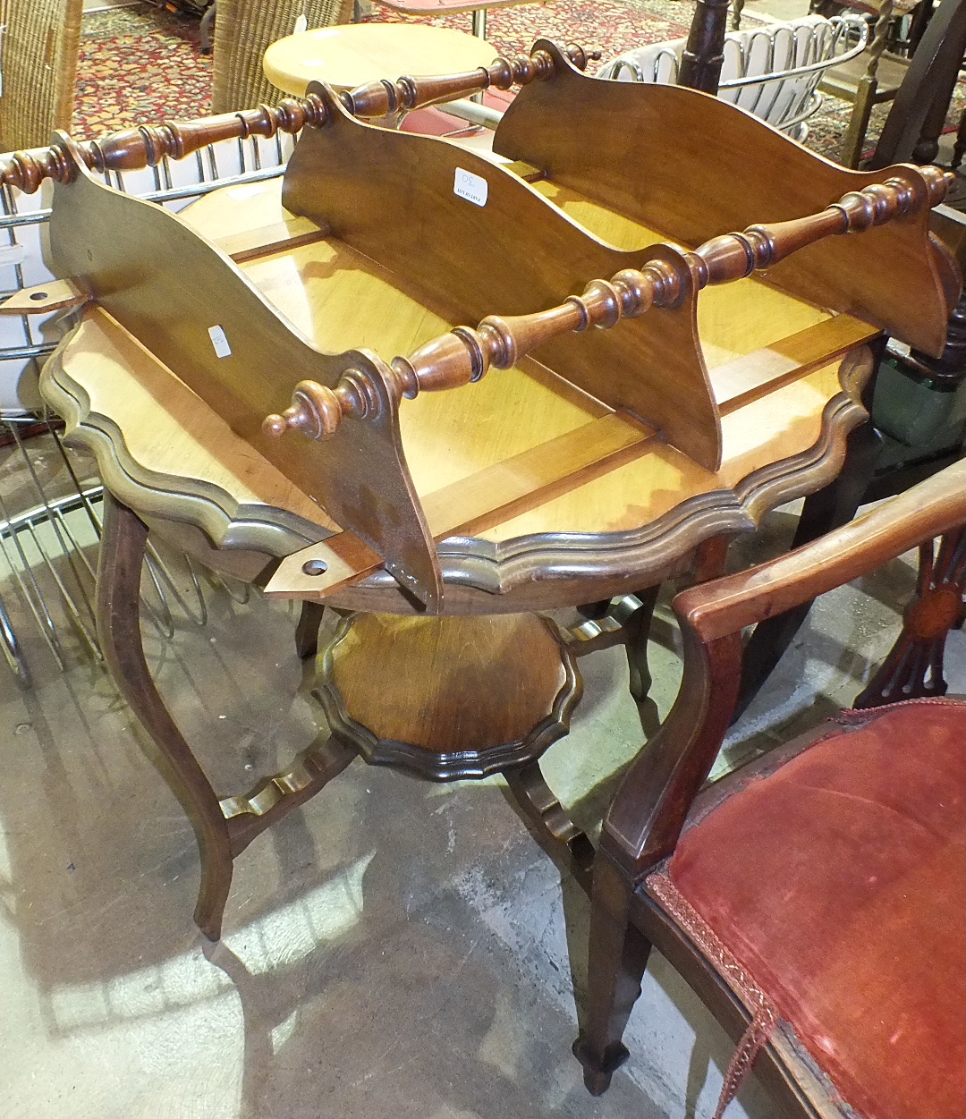 Four mahogany-framed dining chairs, a three-tier wall shelf and an occasional table.