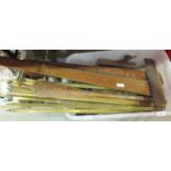 A collection of wooden moulding planes, brass stair rods and miscellaneous items.