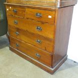 An early-20th century grained pine straight-front chest of two short and three long drawers, 106cm