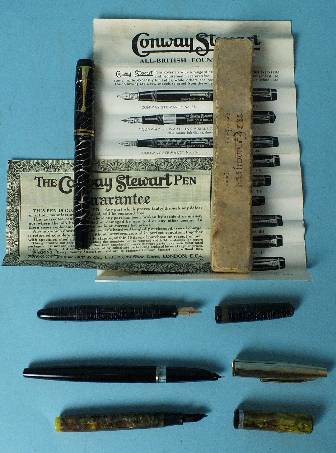 A Conway Stewart 'Duro' No.30 fountain pen with silver veining, with paperwork and box, a Waterman's