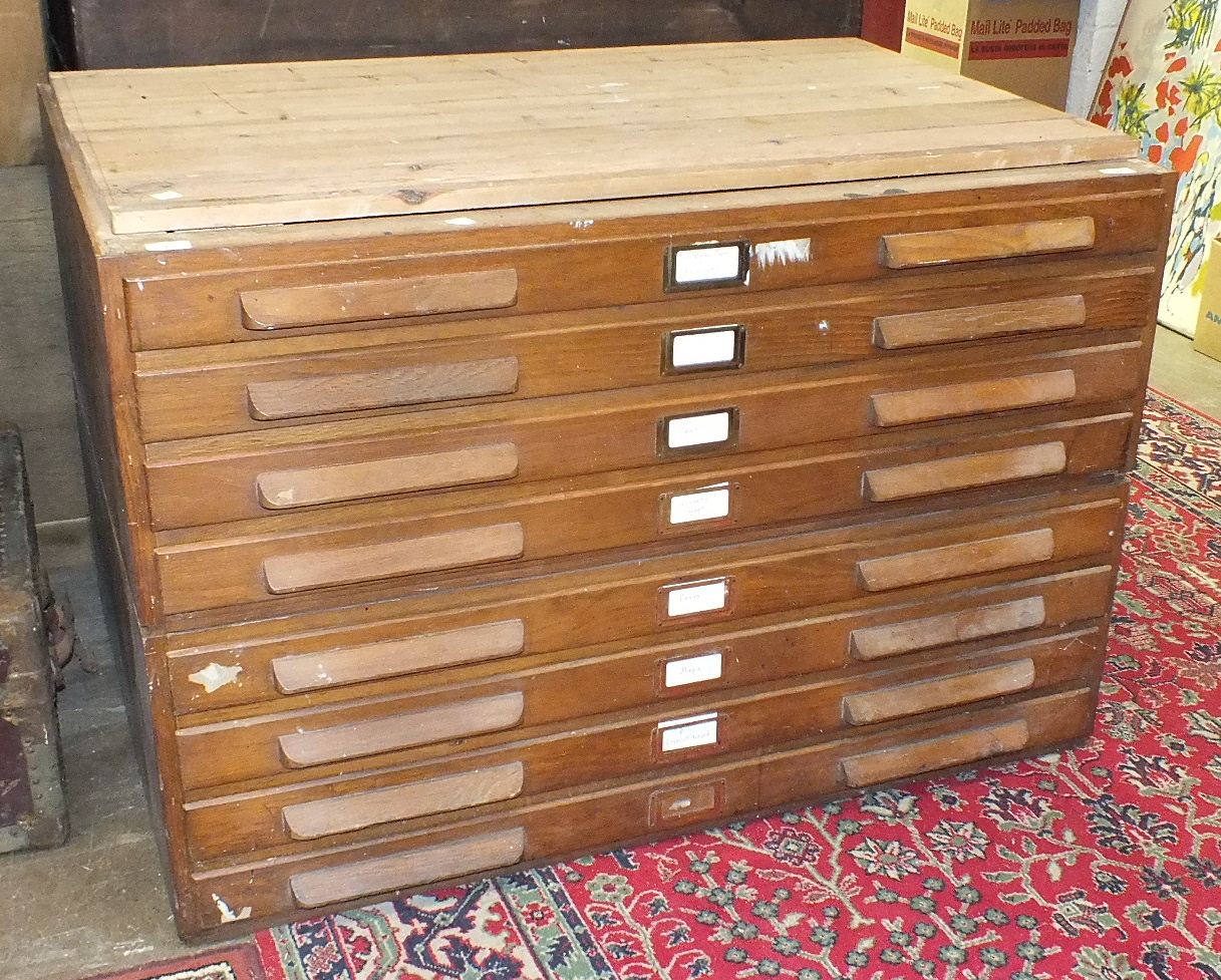 An early-20th century oak eight-drawer plan chest, 116cm, in two sections.