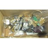 A quantity of costume jewellery, including long sphinx ear drops and a faux jade necklace.