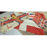 A Union Jack and other flags, various prints and miscellaneous items.