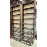 Two narrow sets of pine shelves, 202cm high and a carved wood plate rack, (3).