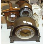Three oak mantel clocks, a mahogany mantel clock and a 400-day clock under plastic dome.