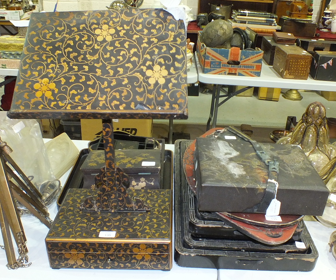 An early-20th century lacquered table lectern stand, 60cm high, (a/f), other lacquered boxes and