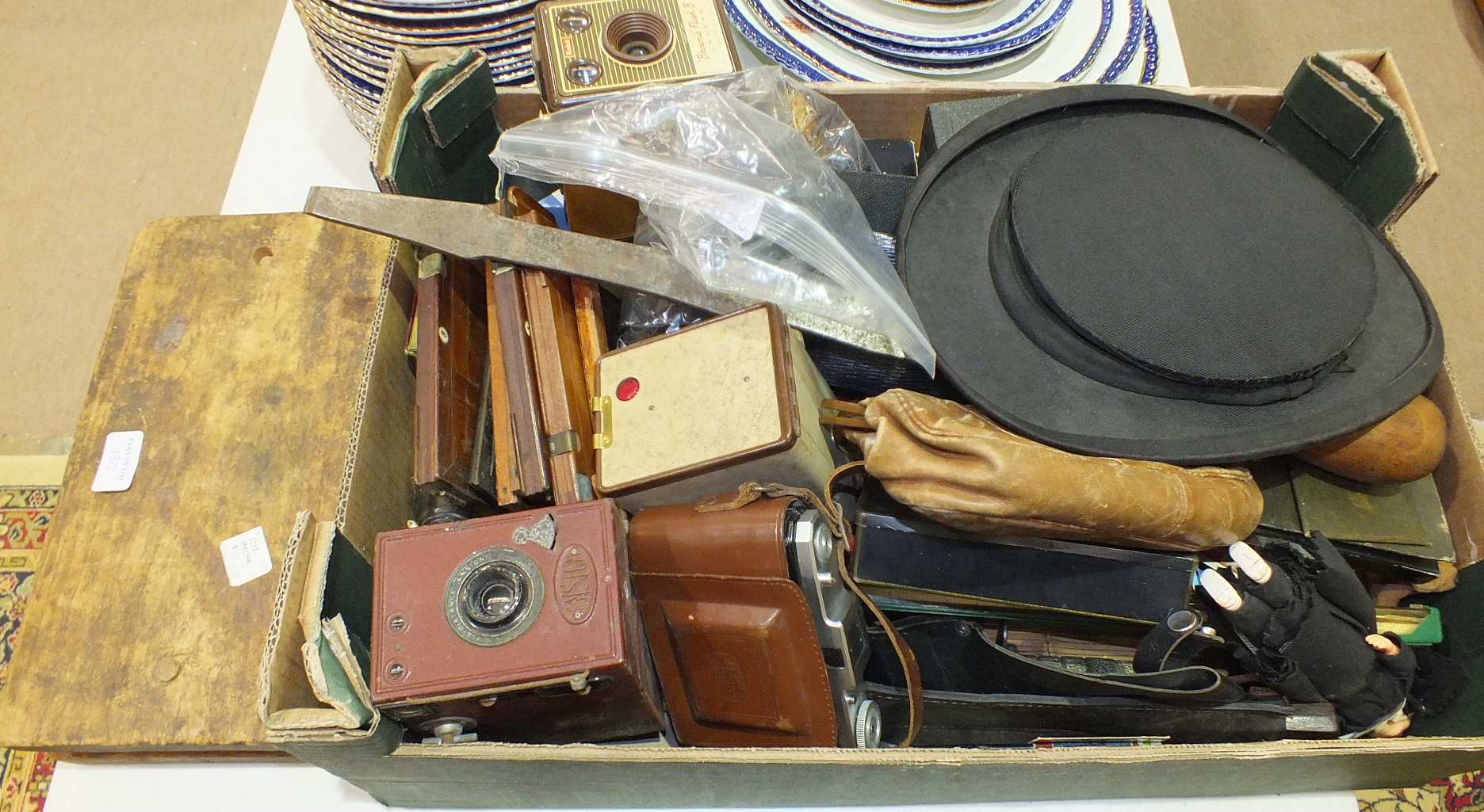 A folding opera top hat, (in poor condition), a wooden cigar mould and other collectable items.