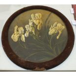 A large terracotta plate painted with yellow Irises, 40cm diameter, in circular velvet-covered