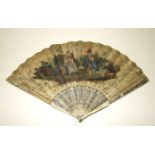 An 18th century fan, the guards and sticks carved and heightened in gold and silver, the chicken